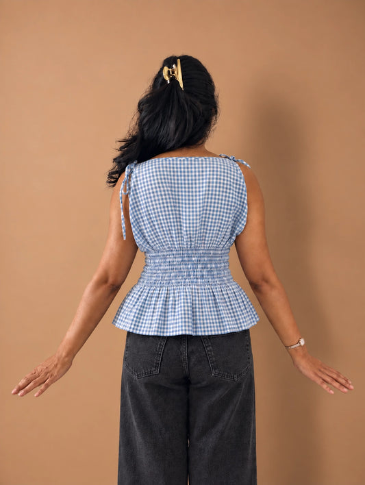 mazo Bluebell Breeze Tie-Top, back view showing the smocked bodice and peplum hem