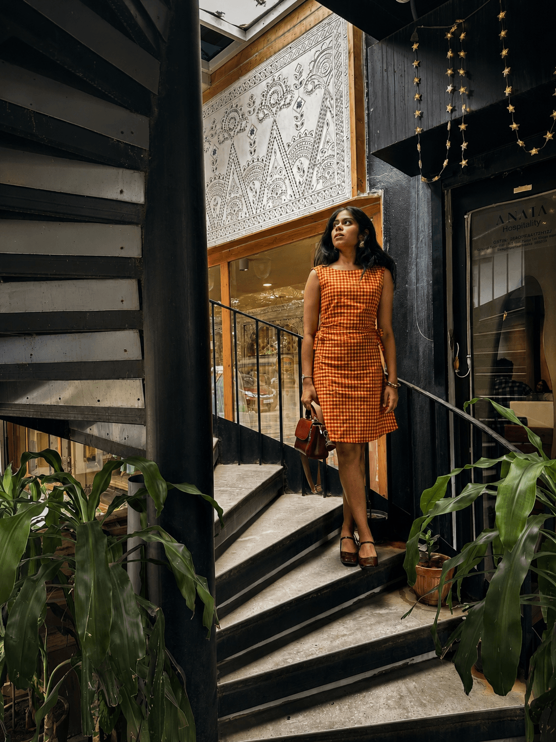 Woman in the Summer Jam Midi Dress on black and white striped steps