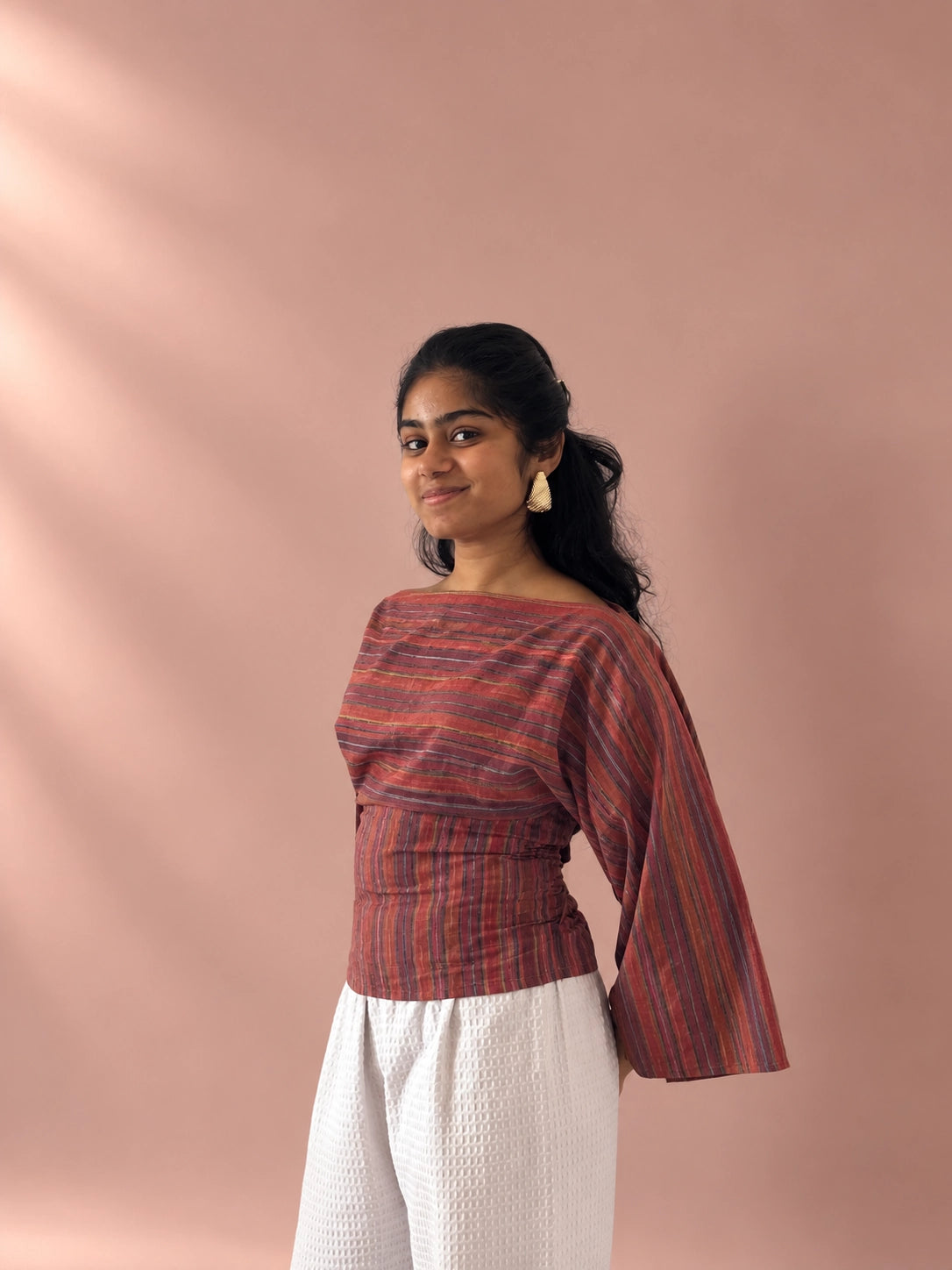 mazo Rosé Stripe Tie-Back Top, side view worn with white trousers
